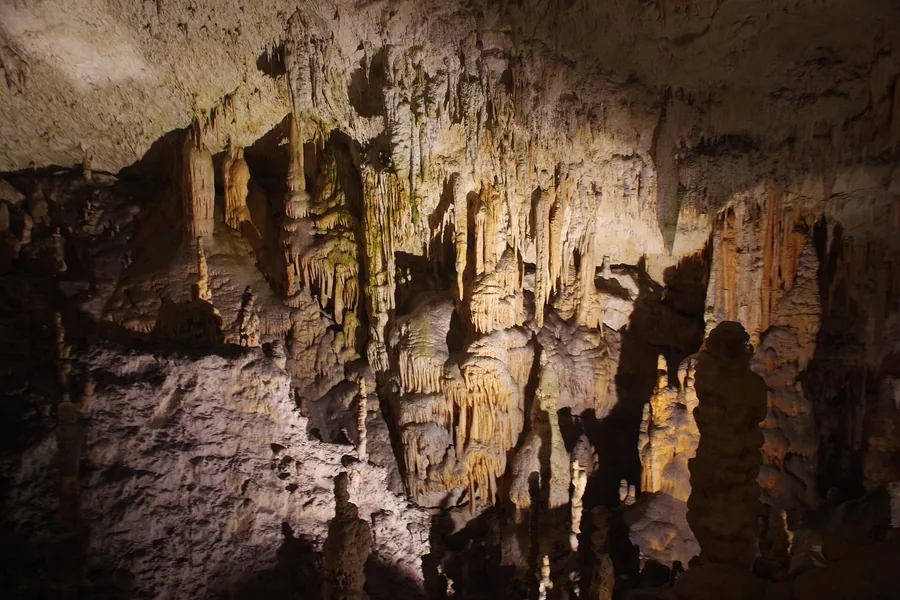 Illuminated stalactite gallery inside Postojna Cave
